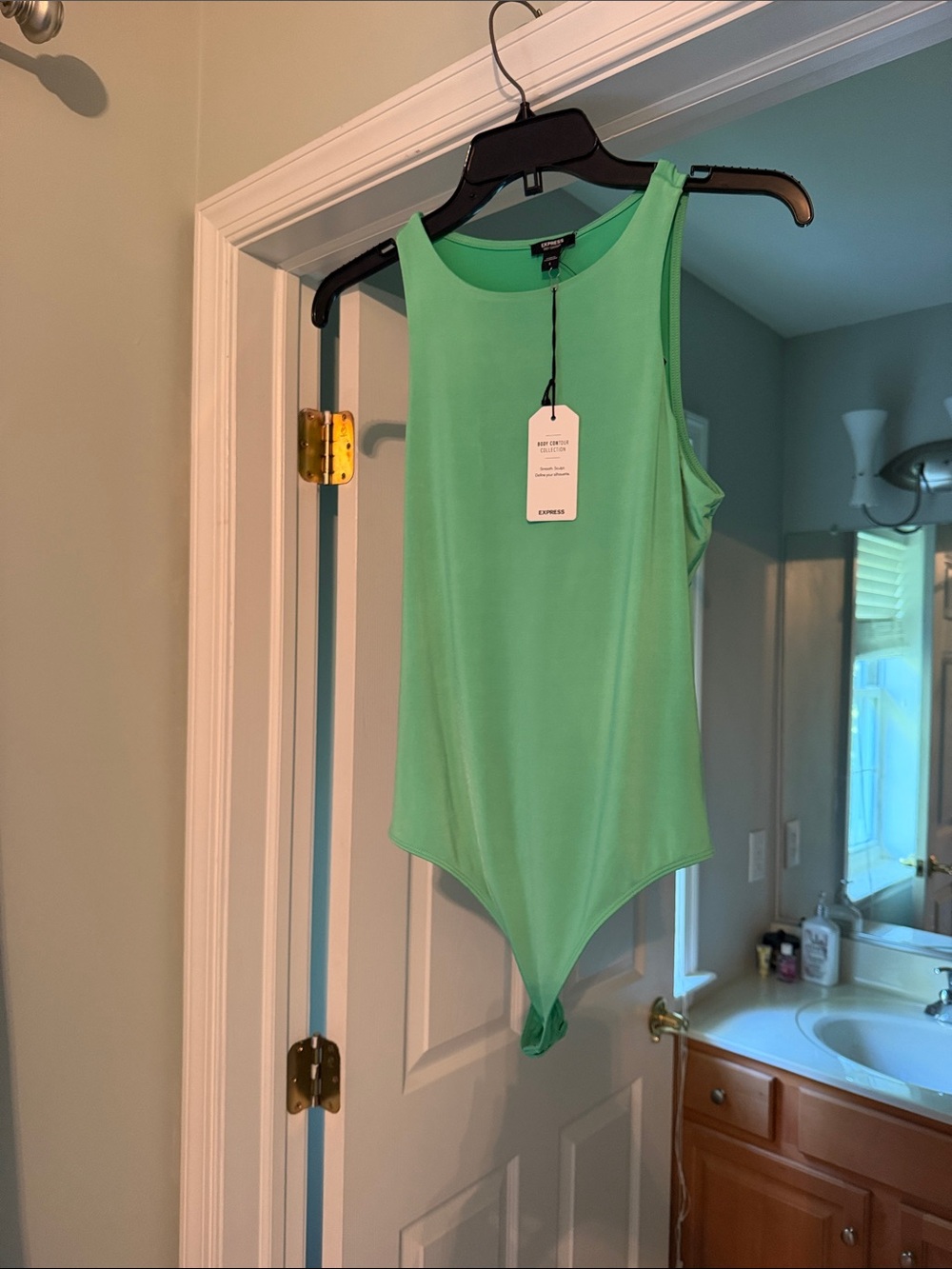 Express Sleeveless One-Piece Bodysuit in Green